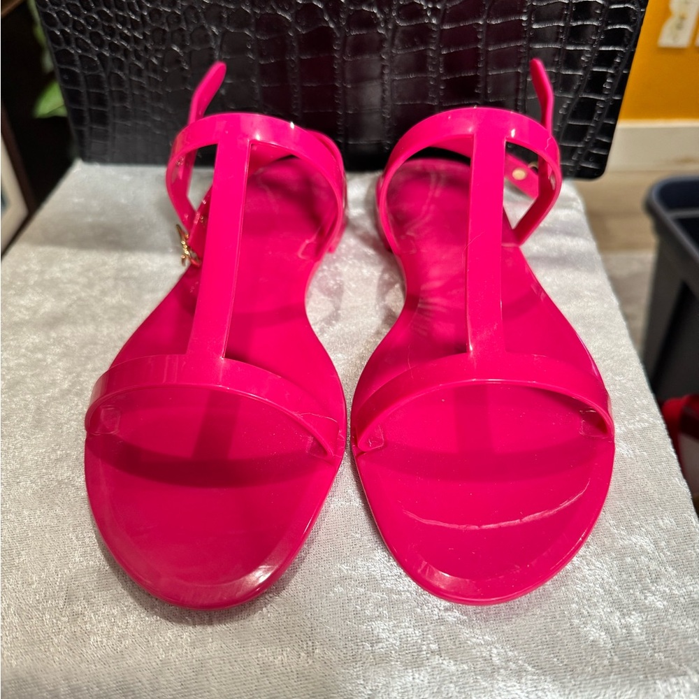 Stuart Weitzman Pink Sandals with T-strap Design and Adjustable Ankle Strap